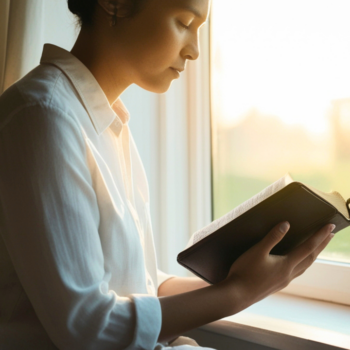 Person reflecting with faith while processing grief and emotional healing after loss.