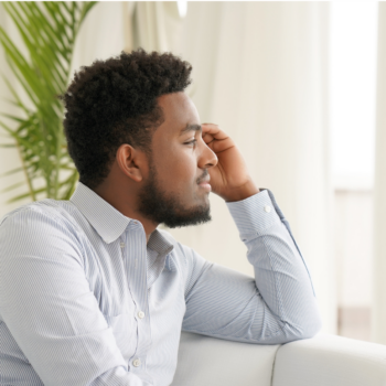 • Person reflecting while processing grief and emotional healing after loss.